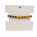 Pulsera Hilo Ojo Turco Negra y Amarillo