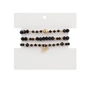 Set Tres Pulseras Negras con Dijes Dorados de Corazon